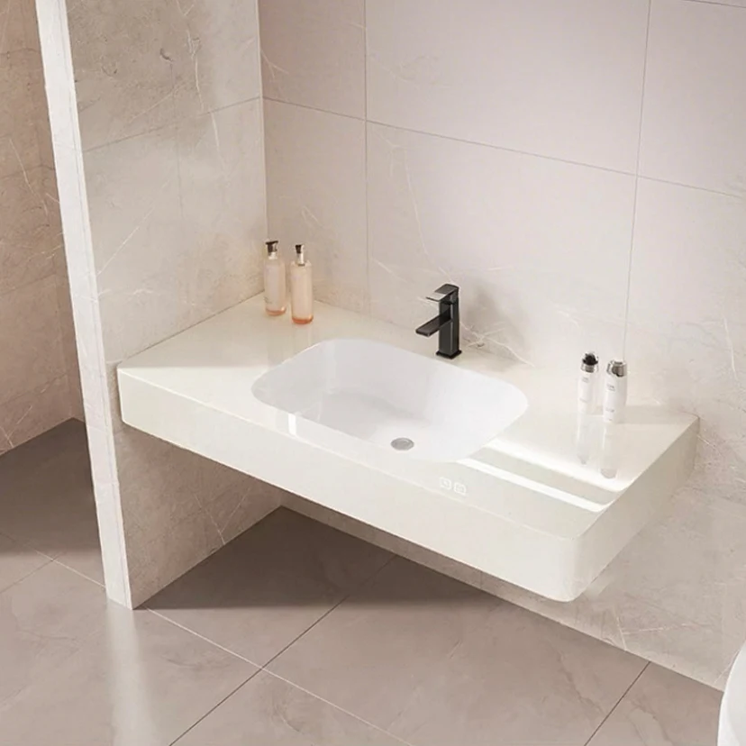 

Rounded rock slab integrated basin washbasin hotel bathroom ceramic seamless