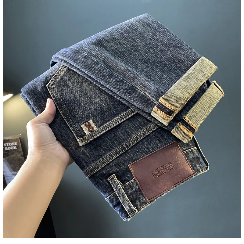 Men's jeans 2025 autumn new fashion high-end trend embroidered print loose tapered elastic pants men