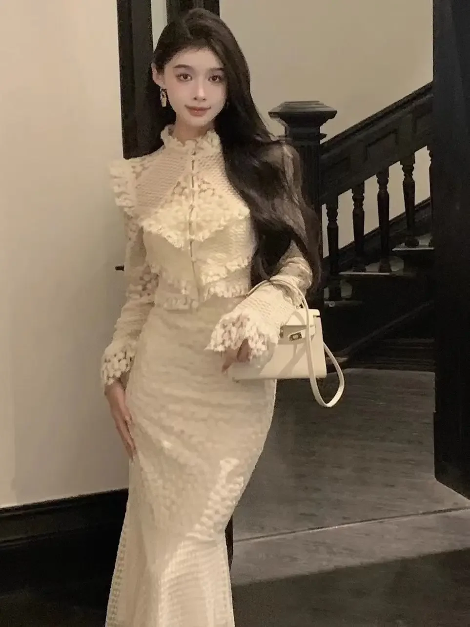 2025 principios de primavera nuevo de gama alta avanzada elegante industria pesada nicho diseñado encaje empalme Top + falda de cola de pez para mujeres