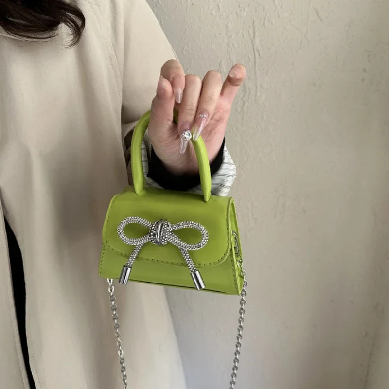 Minibolso de hombro con diseño de lazo para mujer, bandolera femenina con solapa de cuero PU, con cadena, a la moda, 2024