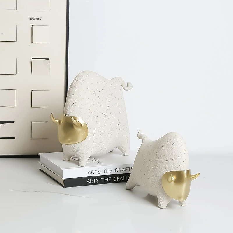 

New Chinese modern sandstone abstract golden horn cattle ornament model room hotel coffee table desktop decoration creative