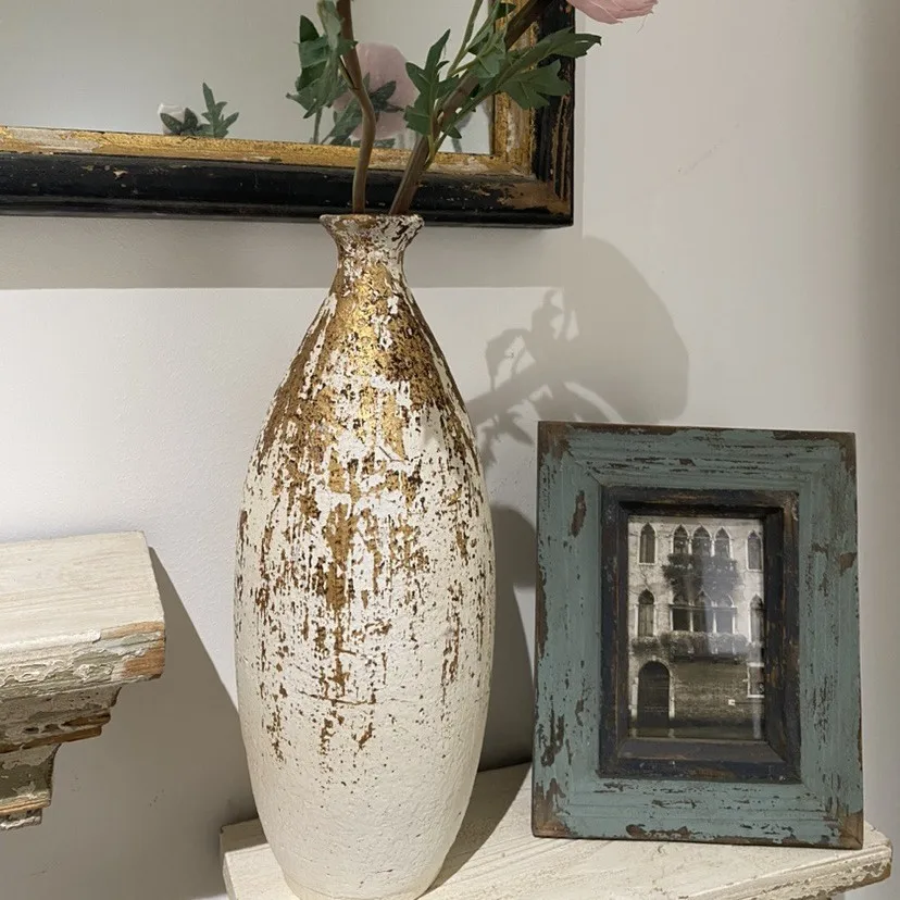 Vintage-style home resin flower vases display indoor and outdoor floral vessels, decorative ornaments, and unique colors