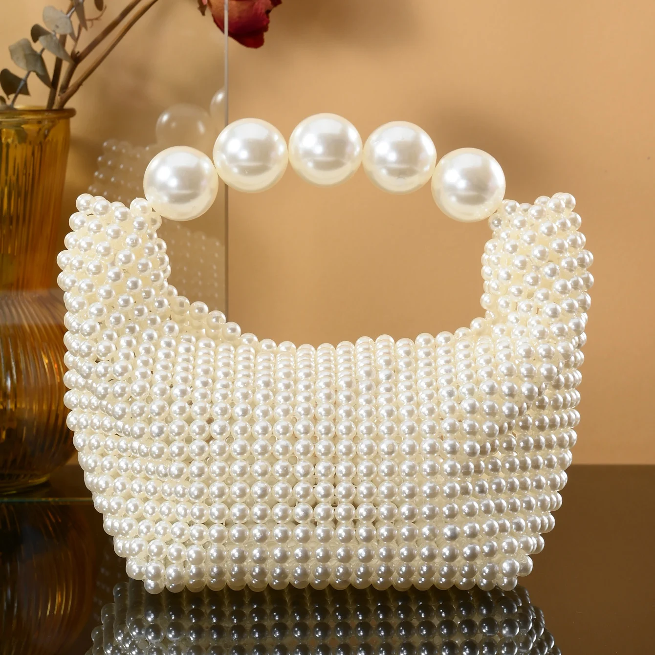 European and American style new beaded handbag Summer women\'s pearl bag hand woven wrist bag Fashion temperament handbag