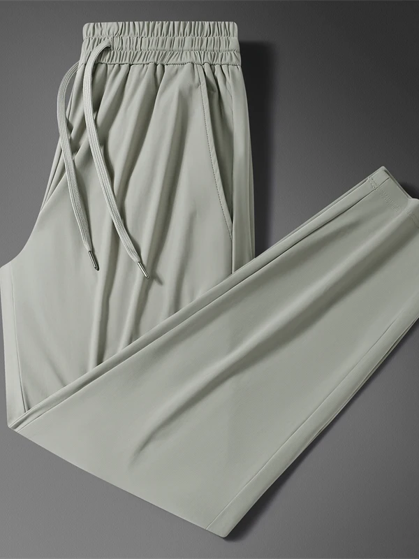 

Новые мужские повседневные брюки из ледяного шелка 2025 года с эластичным поясом, легкие, дышащие, гладкие, свободного кроя, спортивные, прямые штанины