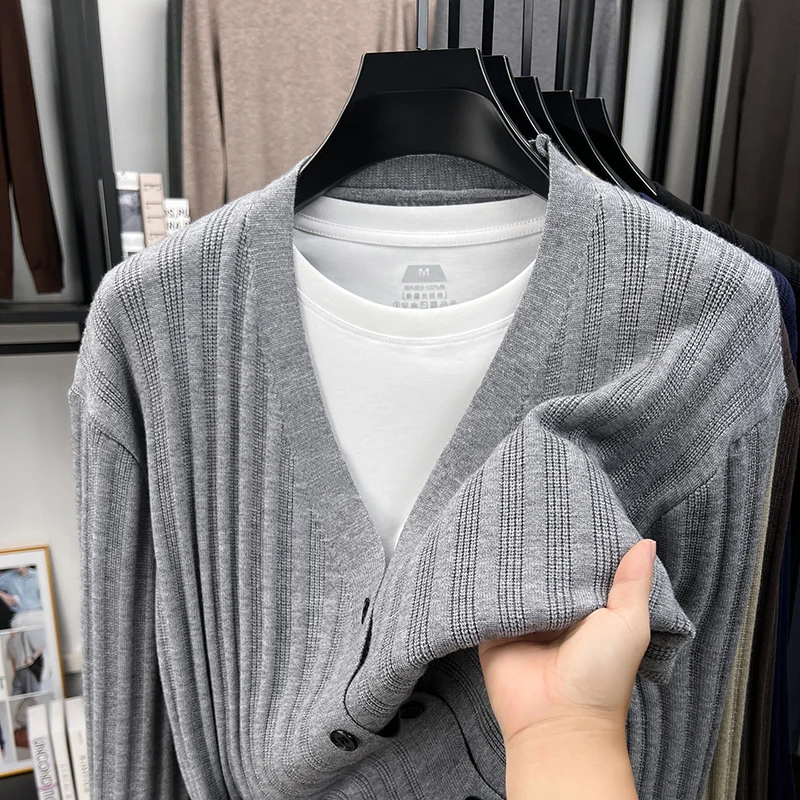High Quality New Men's knitted cardigan fashion V-neck casual vertical striped jacquard comfort button solid color shawl coat