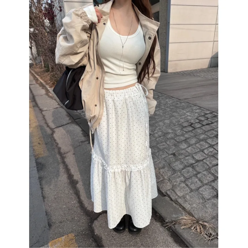 

Новая весенняя коллекция: Элегантная женская прямая юбка с эластичным поясом на шнурке, с декоративными вставками и волнистым узором в горошек.