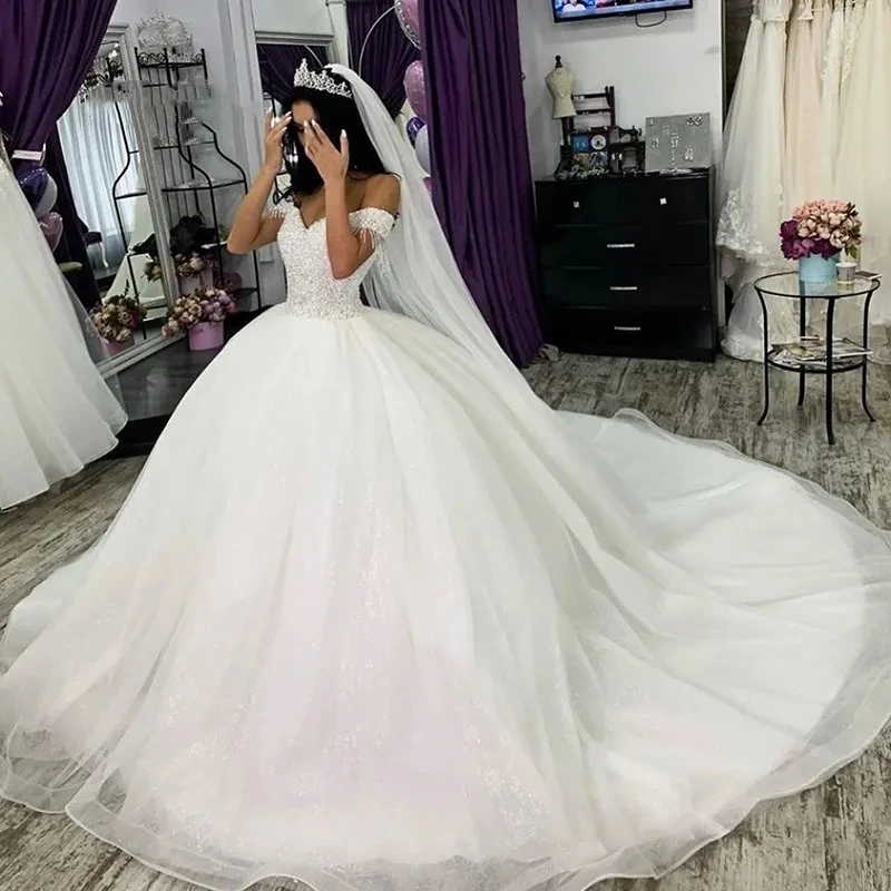 Stunning Crystals Beaded Ball Gown Wedding Dresses Sexy Off Shoulder Cap Sleeve Bridal Gown Puffy Corset Back Vestidos De Novia 