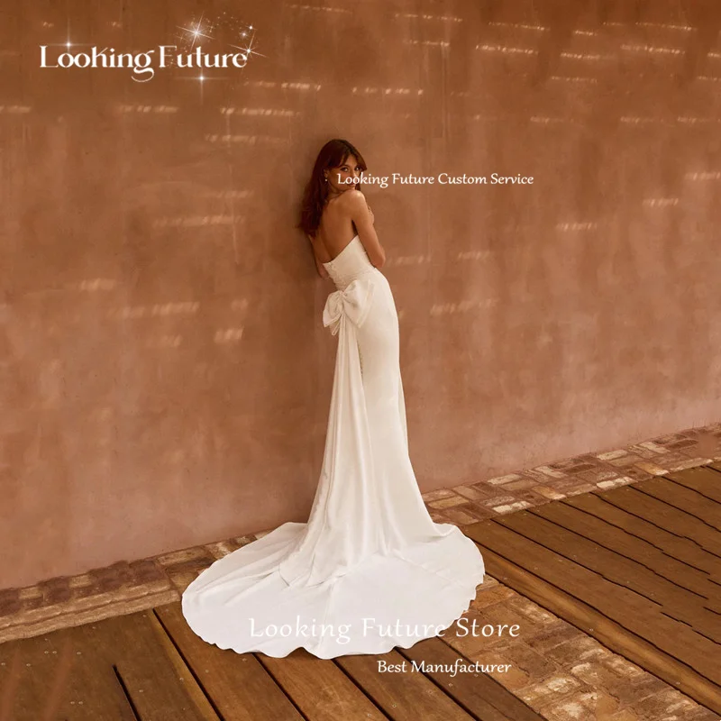 Elegantes Meerjungfrau-Hochzeitskleid in Elfenbein, sexy Spaghettiträger, Falten, offener Rücken mit Schleife, Kleid, schlicht, trägerlos, Hofschleppe, individuell gestaltet
