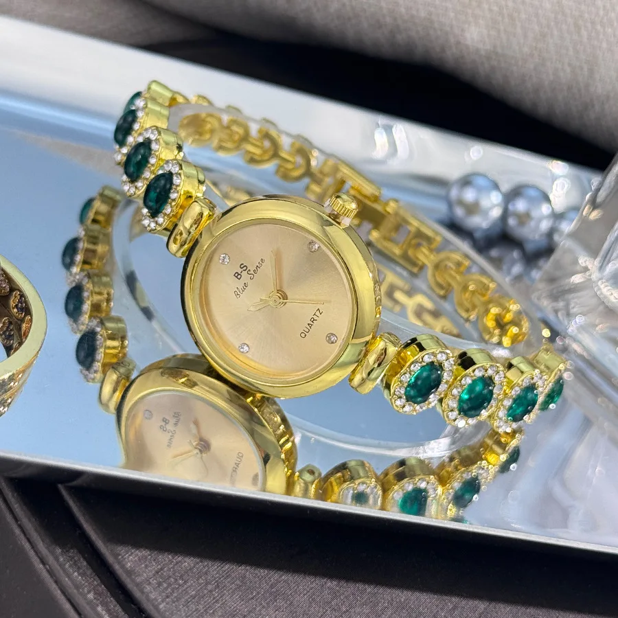 นาฬิกาควอทซ์เพชรสำหรับผู้หญิงสุดหรูพร้อมสร้อยข้อมือแบบเครื่องประดับและหน้าปัดทรงกลม