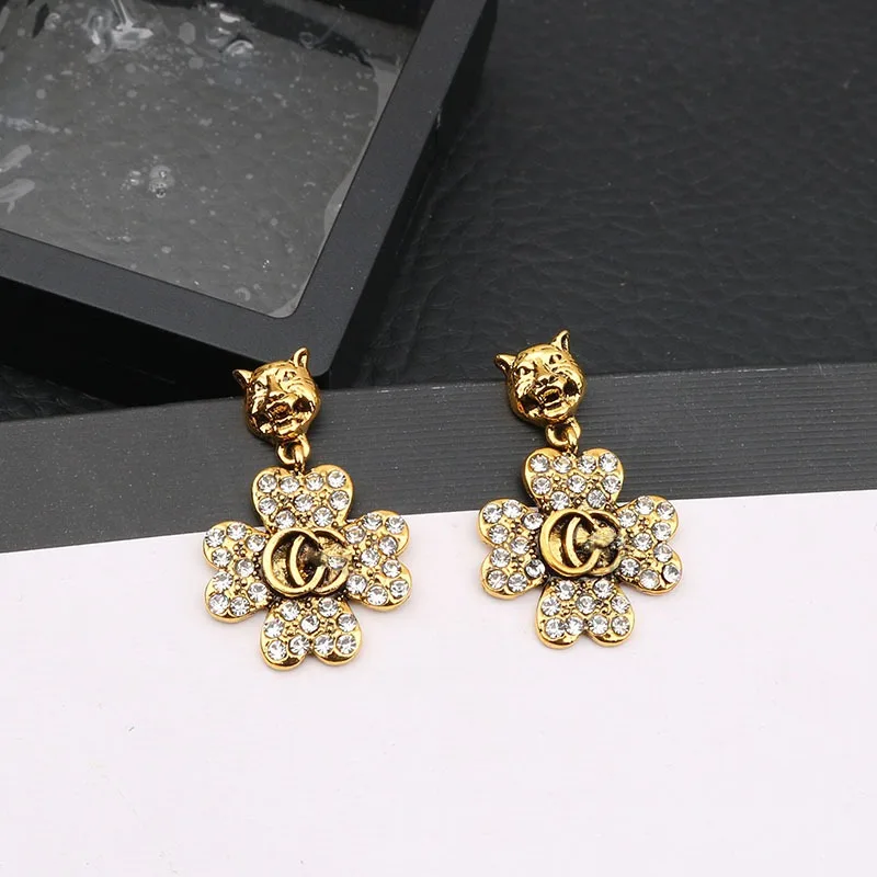 أقراط نسائية فاخرة على شكل زهرة برونزية عتيقة 2025 أقراط رأس GG جديدة مجوهرات نسائية هدية للحفلات