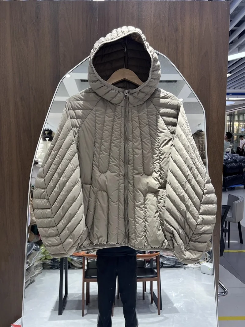 2025 秋冬新作特大ゆったり軽量ダウンジャケット女性のファッションフード付きホワイトダックダウンコート w1095