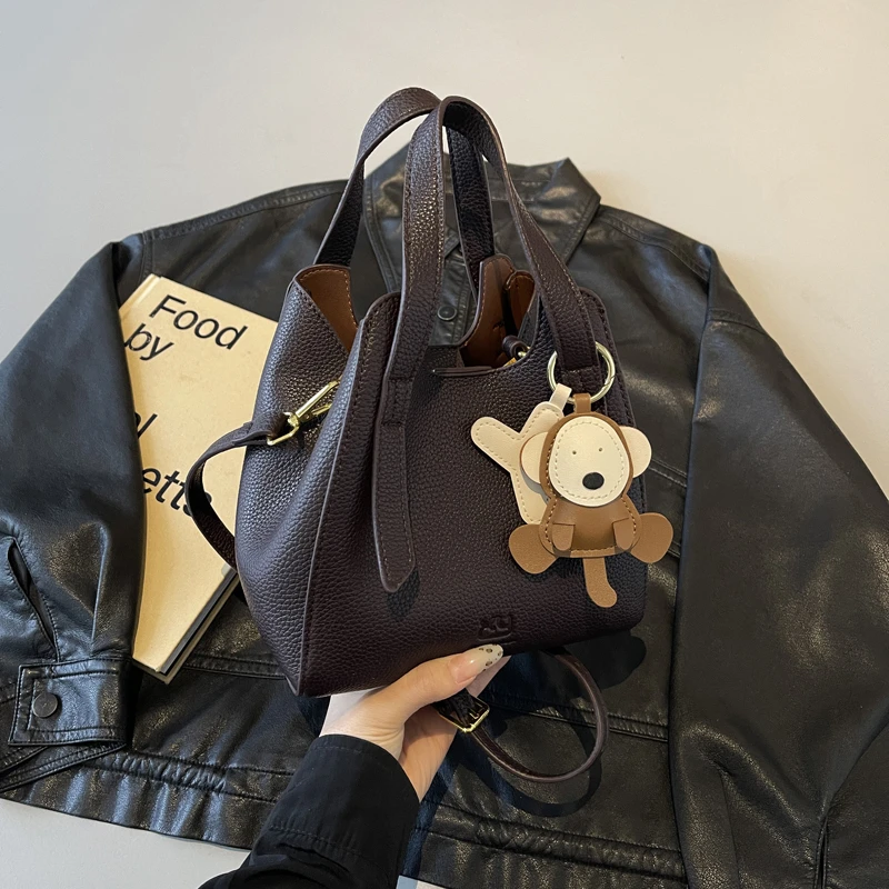 

Сводная женская сумка-мешок через плечо, кожаная сумка Briti Sle, мягкая ручка, магнитная синяя застежка, ежедневное использование