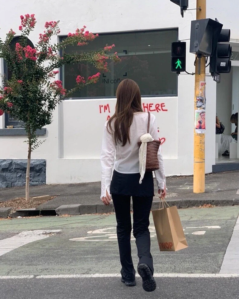 Faionable taille haute pantalons décontractés avec jupe ourlet conception Sli Look tendance pantalon à jambe droite fermeture à bouton pantalons longs