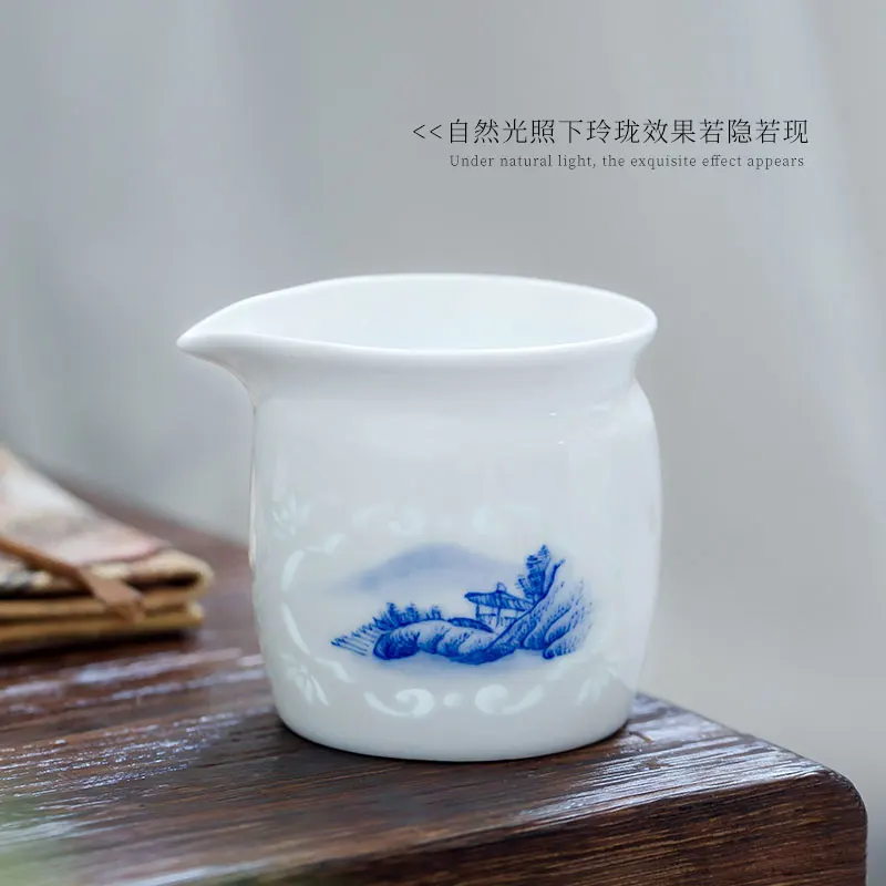 

Jingdezhen Single Hand Painted Blue and White Rice-Pattern Decorated Porcelain Pitcher Tea Pitcher Hollow Porcelain Kung Fu Tea