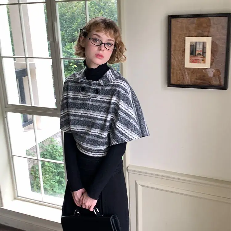 2026 Short Lapel Shawl Big Swing Sleeve Knitted Striped Contrasting Sweater Top French Versatile Splicing Korean Version