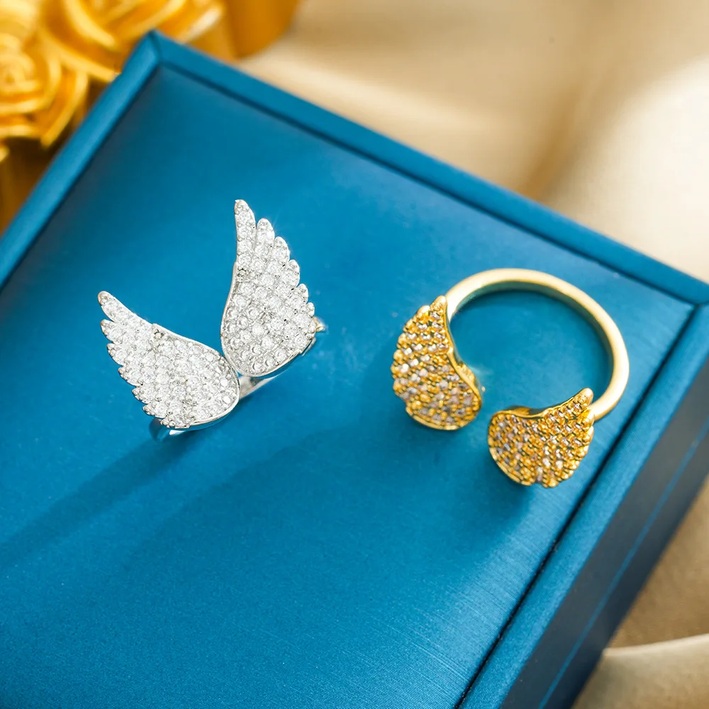 

A female niche design of a copper-plated 18K real gold ring with exaggerated wings and zircon openings