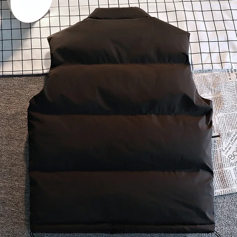 صدرية شتوية دافئة لعام 2025 معاطف نسائية بدون أكمام وياقة واقفة ملابس خارجية دافئة سترة منتفخة خفيفة الوزن غير رسمية للنساء سترات