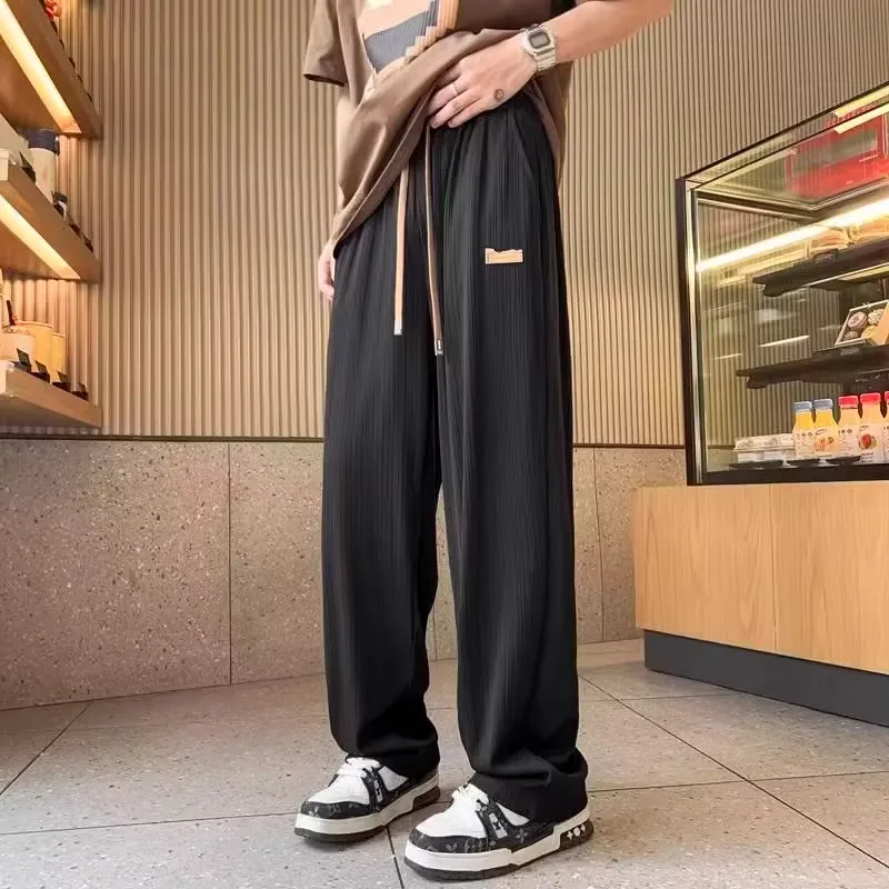 

Свободные мужские повседневные брюки из ледяного шелка, летние тонкие прямые брюки, универсальные модные дышащие длинные брюки