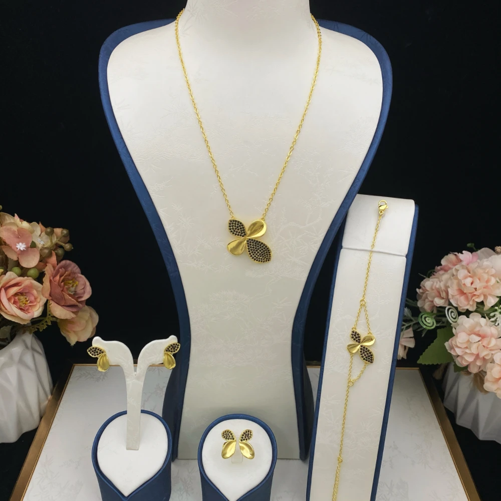 

JRH Дубай Стиль Четырехлистный клеверный комплект с кубическим цирконием Позолоченный медный браслет Кольцо Ожерелье Серьги Партии Женские украшения