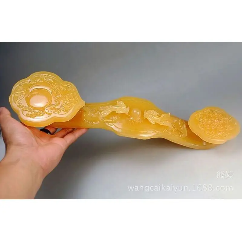 Beige jade Ruyi ornament, a lucky charm for opening a business or moving into a new home, a jade Ruyi for home decoration and as
