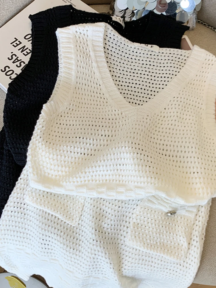 Sommer Einfache Mode Aushöhlen Gestrickte Kleid für Frauen Sexy Chic V-ausschnitt Ärmellose Dünne Kleider Spicy Girl Mini Kleider