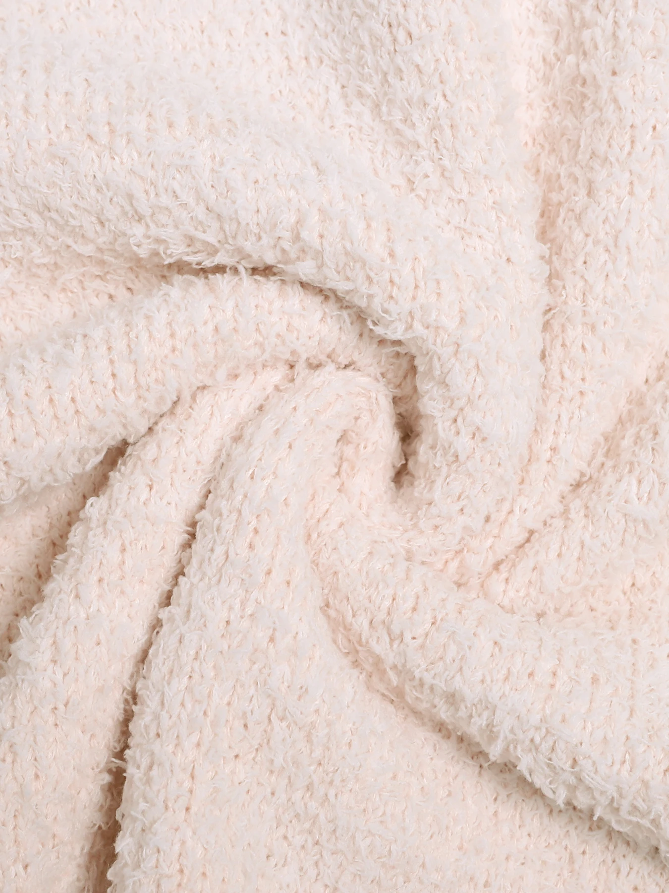 เสื้อกั๊กไหมพรมผู้หญิงสีเบจทรงโอเวอร์ไซส์ แขนกุด คอกลม ผ้ามีเท็กซ์เจอร์ ทรงหลวม