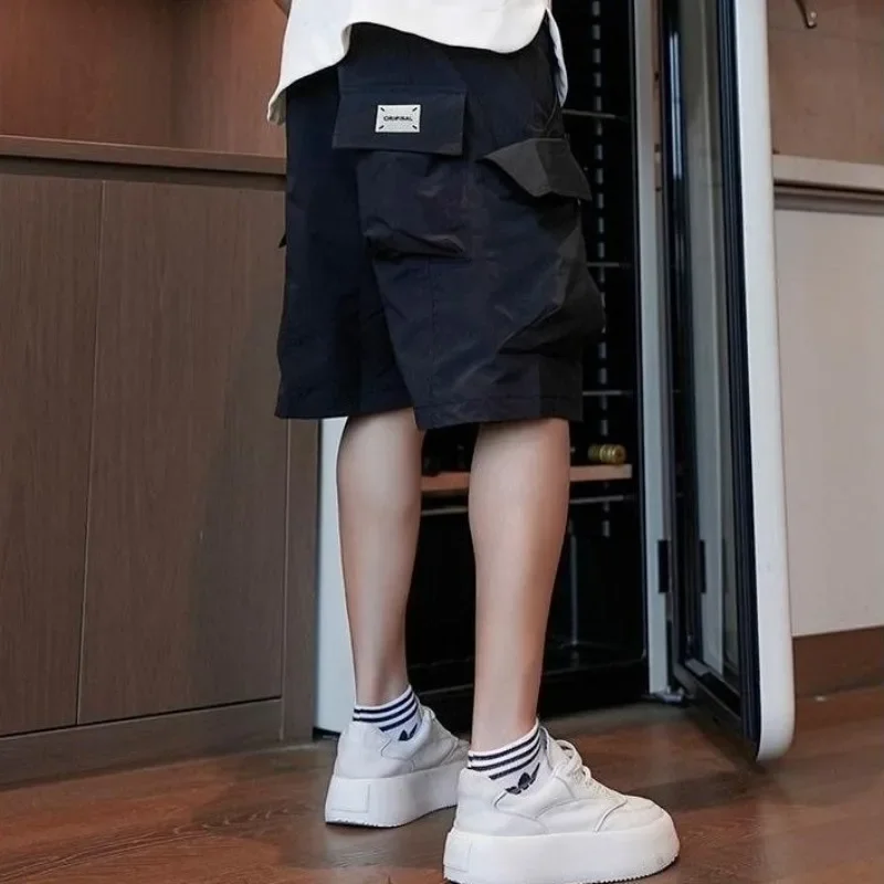 

Мужские короткие брюки с завязками, свободные широкие мужские шорты-карго с несколькими карманами и эластичной резинкой на талии, мешковатые однотонные популярные Hevy Whate Nylon