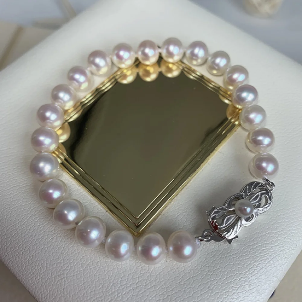 

Natural Pearl AAAA7-8mm Japanese Round Pearl 925s Button Simple Fashion Bracelet 7.5-8in