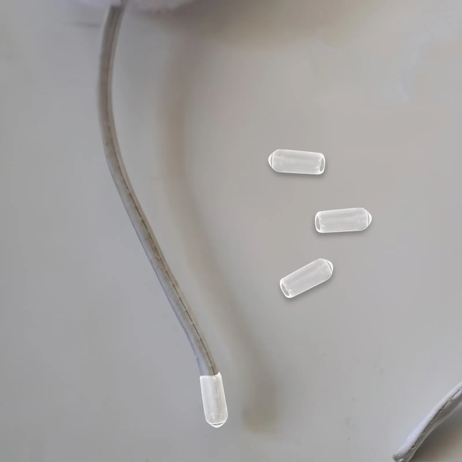 

200 шт. резиновых наконечников для повязок на голову, мягкие гибкие сменные накладки, защитные аксессуары для концов повязок, заглушки для резинок для волос