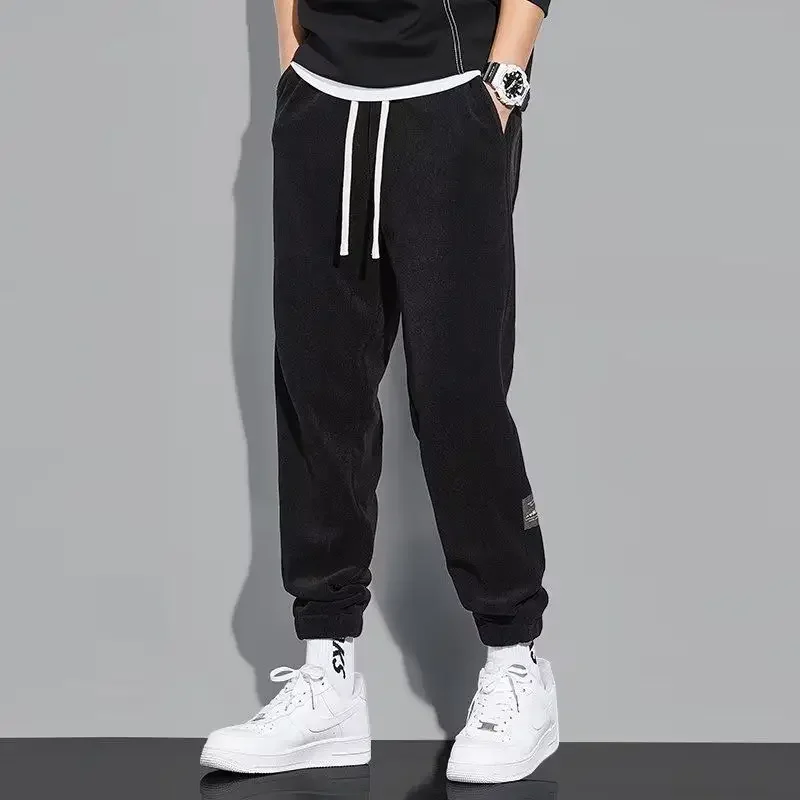 Pantaloni sportivi maschili semplici Harem pantaloni sportivi da uomo autunno e inverno pantaloni di velluto a coste larghi Retro originale caldo prezzo economico Xxl