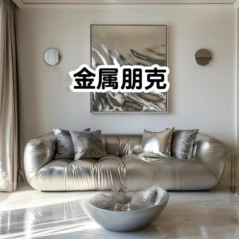Minimalist future punk style niche designer studio store lobby silver pearlescent leather sofa