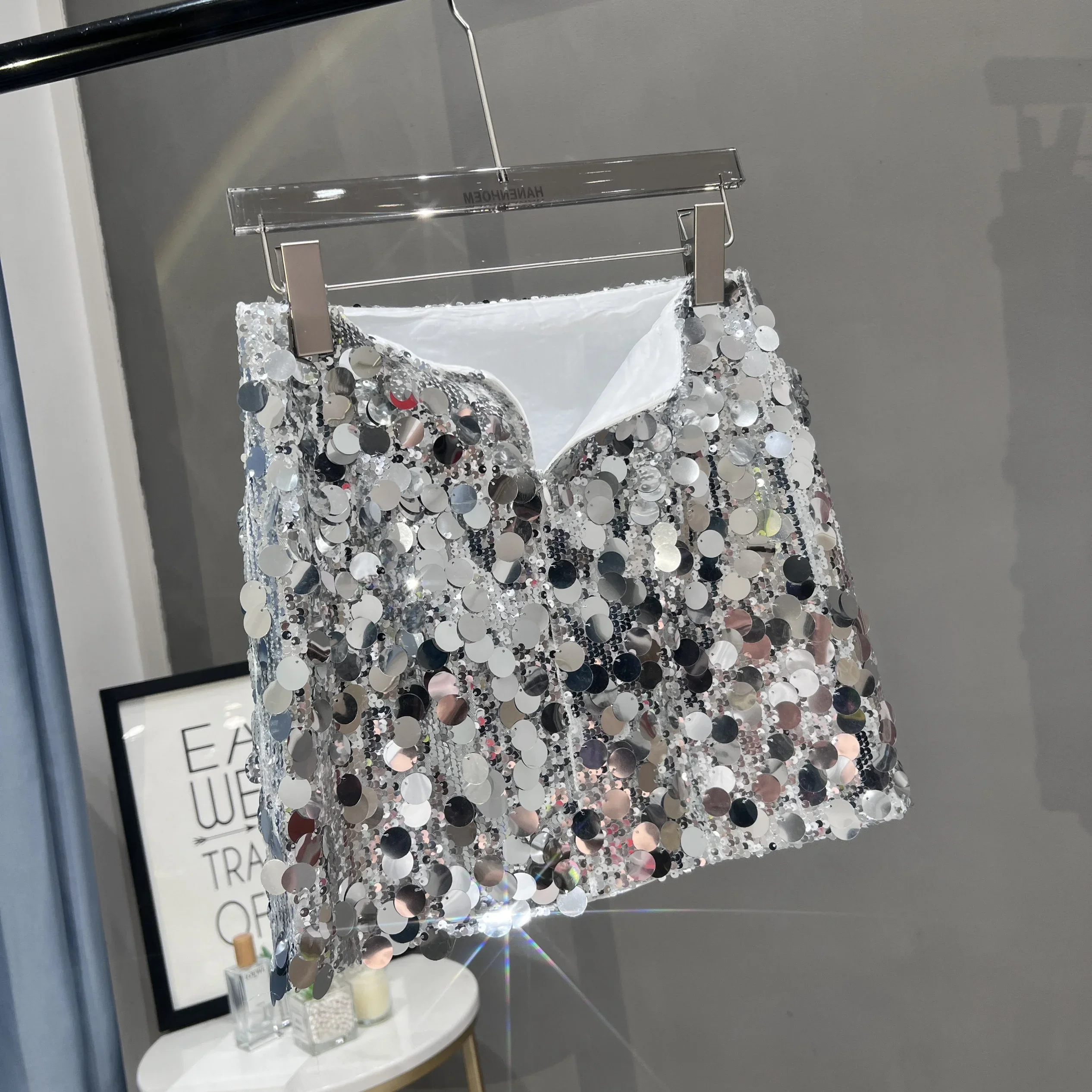 Moda versión coreana de ropa privada brillante Falda corta de verano con lentejuelas para mujer fiesta de Festival de Música delgada y delgada