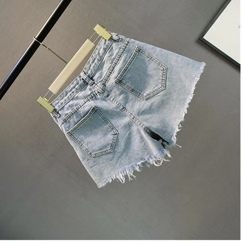 شورت دينم للنساء ملابس الشارع صيف 2026 جديد فضفاض للتخسيس نظرة مثقوبة حجر الراين هامش ألف خط واسعة الساق السراويل الساخنة