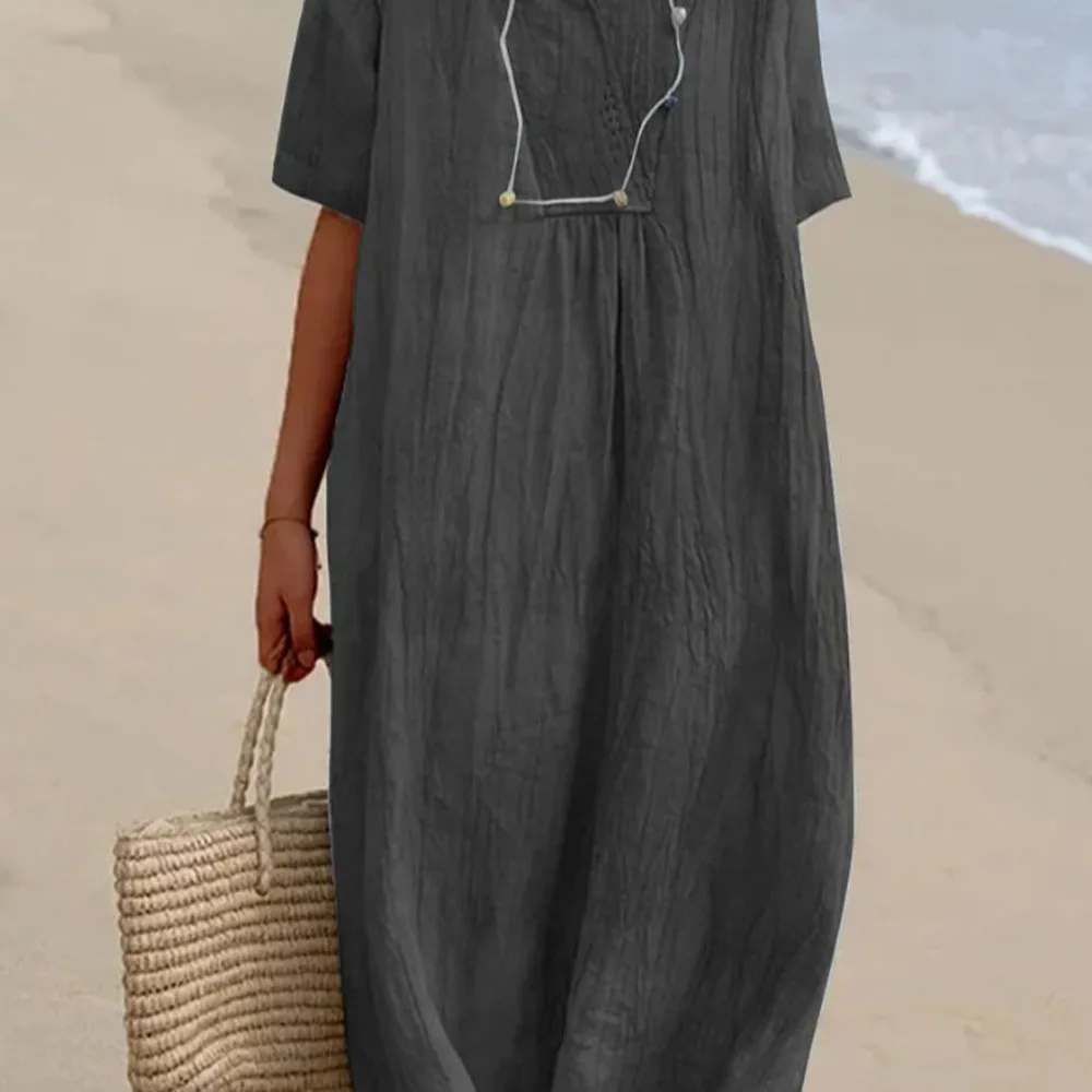 فستان نسائي من القطن والكتان الشهير لعام 2025 بلون سادة ورقبة على شكل حرف v كبيرة بنمط عصري فضفاض من القطن والكتان بأكمام قصيرة #4