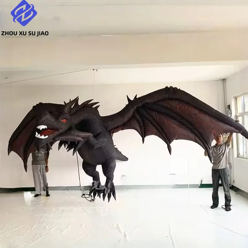 

A large dragon flying inflatable black suspension with LED lights for carnival stage decoration, an evil inflatable driving drag