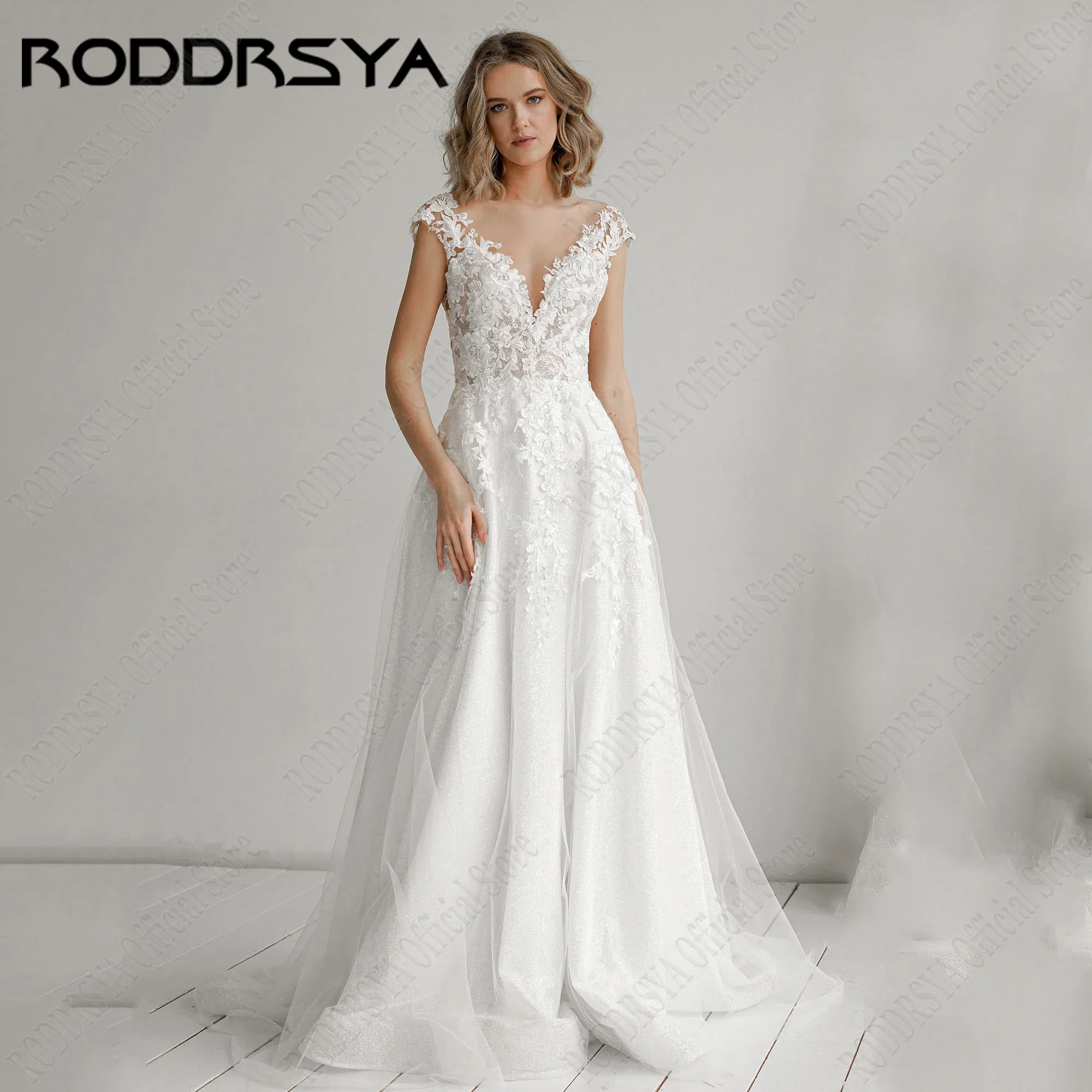 

RODDRSYA Shiny Tulle Wedding Dress 2024 A-Line Cap Sleeves Scoop Neck Applique Bridal Gowns Button Backless Vestidos De Novia