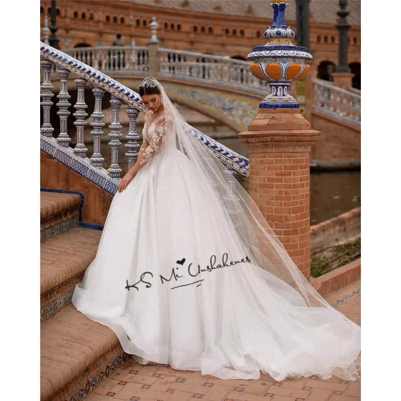2024 Elegant Ball Gown Wedding Dresses O Neck Long Sleeve Beads Lace Bridal Dress Princess Church Wedding Gowns Illusion