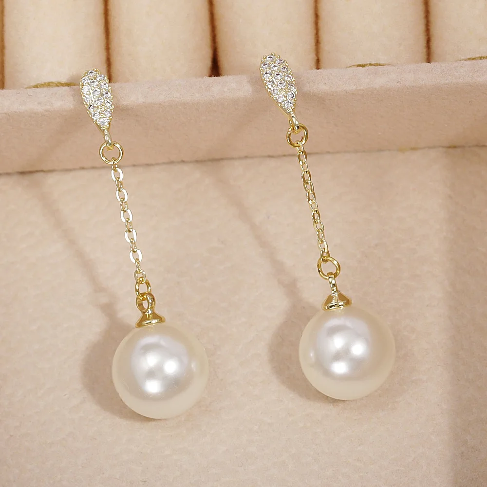 

Fashionable and exquisite long tassel pearl earrings, high-end zircon earrings, versatile slimming and elegant earrings