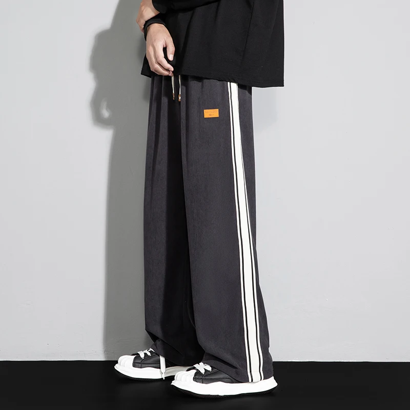 

Мужские свободные спортивные брюки в полоску, осенние модные повседневные брюки прямого кроя, широкие спортивные штаны, трендовые длинные брюки со средней талией