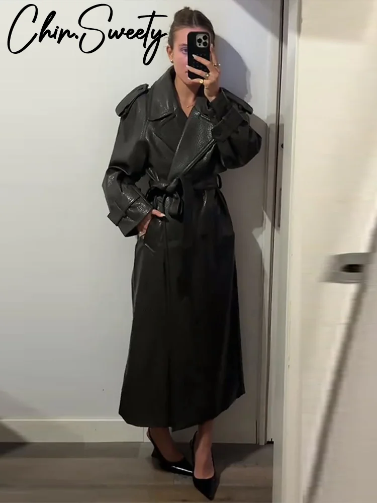 الشارع بولي Leather جلد المرأة معطف طويل موضة كم طويل زر حزام التلبيب جيب الإناث أبلى 2025 الخريف الشتاء سترة حريمي جديد