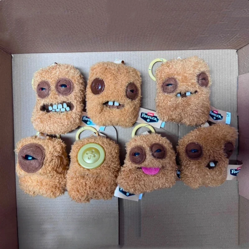 

Предзаказ: Оригинальные плюшевые брелоки-подвески Fuggler Fugg Nuggets Series 10 см для рюкзаков, в виде монстров с уродливыми зубами, мультяшные игрушки-подвески для рюкзаков