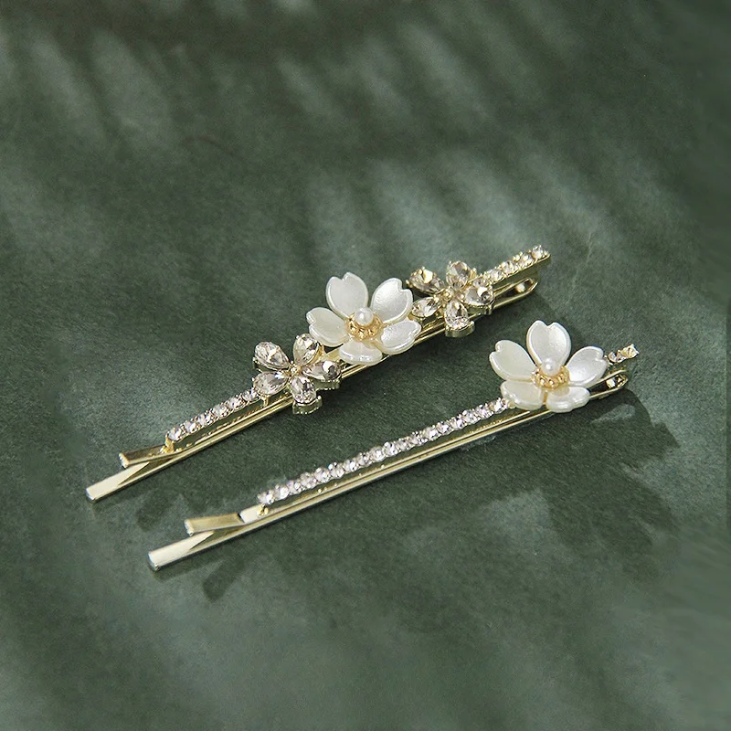 The new Korean version pearl flower zircon one-line hair clip rhinestone side clip temperament female fashion hair accessories