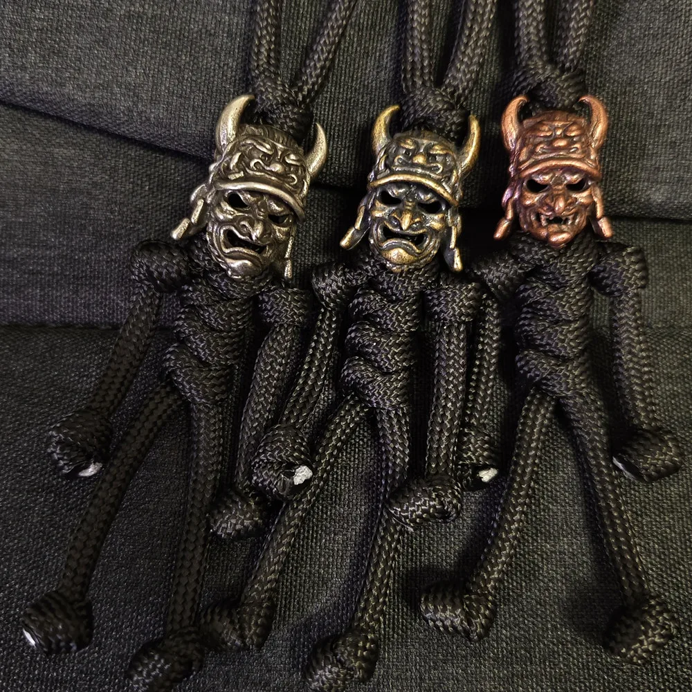 Paracord clasp Woven pendant Hannya mask Knife bead ornament Rope braided keychain Outdoor Backpack Lanyard はんにゃ