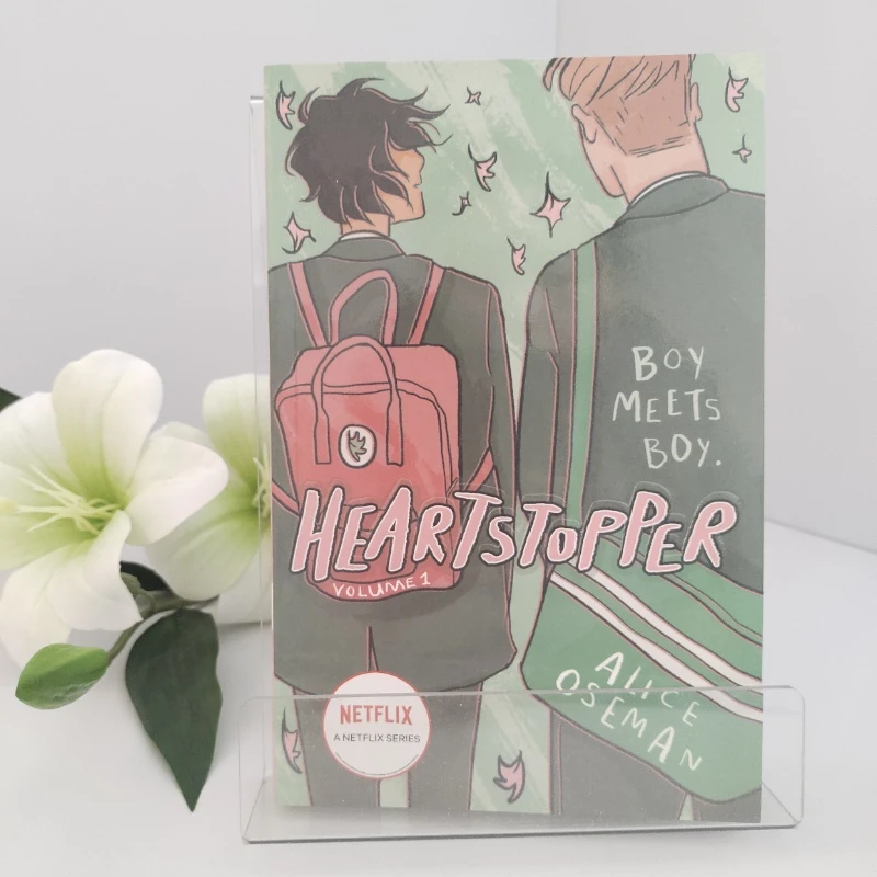 

Heartstopper: Volume One by Alice Oseman LGBTQ+YA Graphic Novel Sweet School Romance Coming-of-Age & Self-Discovery Story Livros