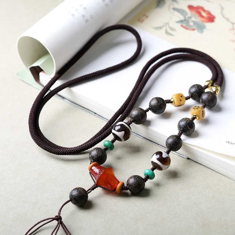 

Hand-woven ants incense wood tiger teeth dzi Tibetan jewellery universal pendant rope literature play yak bone dice lanyard