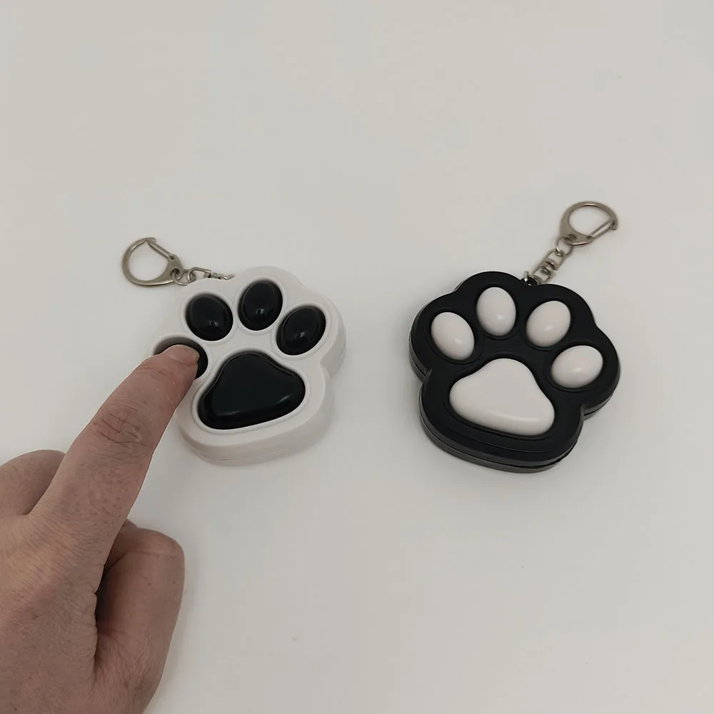 Cartone animato Kawaii gatto artiglio pulsante decompressione giocattolo portachiavi ciondolo coppia carina borsa auto ciondolo portachiavi creativo