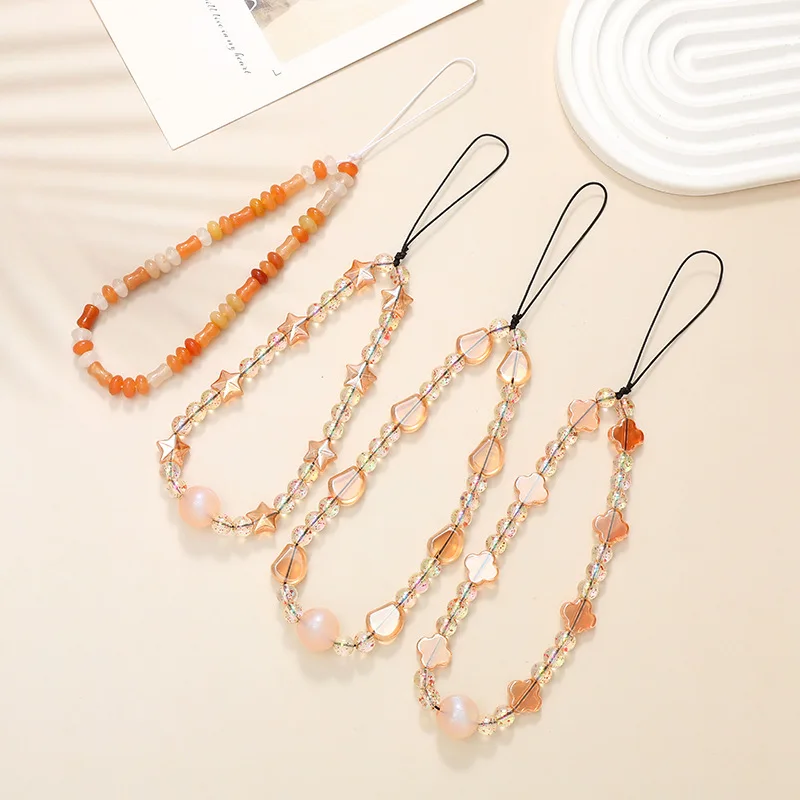 

Цепочка для телефона с пятиконечными звездами и кристаллами из бисера