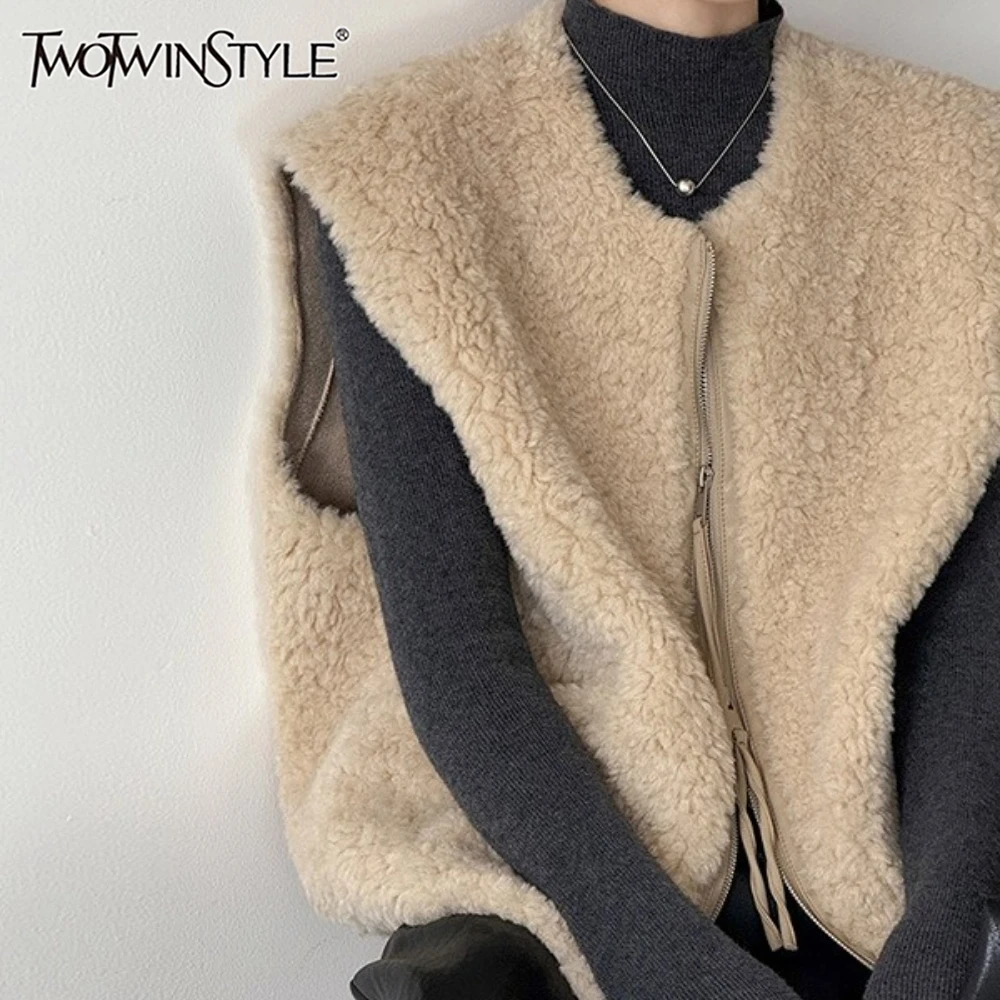 

TWOTWINSTYLE Solid Spliced Fur Streetwear Jacket Female O Neck Sleeveless Loose High End Women's Jackets Autumn Fashion Style