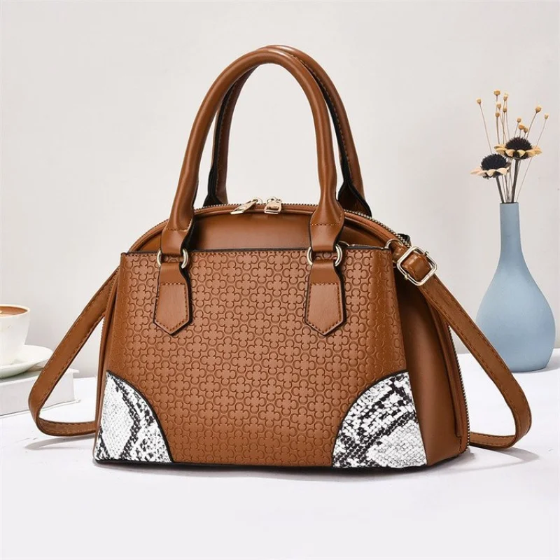 

Trendy Oval Shoulder Bag For Women Unique Shape Leather Crossbody Bag Conversation Starting Fashion Piece