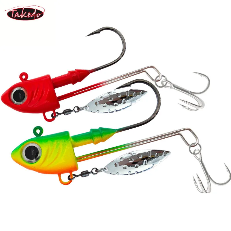 TAKEDO Jig cabeza de pez giratorio anzuelos triples perca bajo